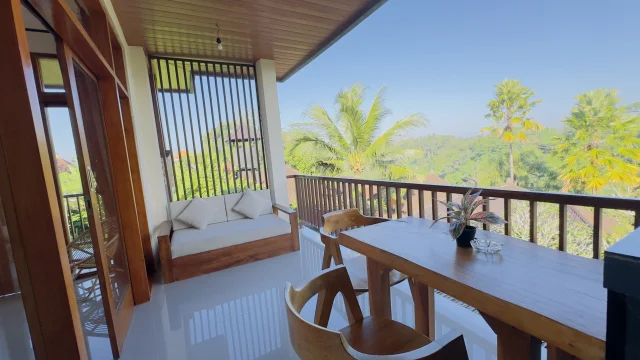 Balcony with sunset views at Jambangan Bali Villa Ubud