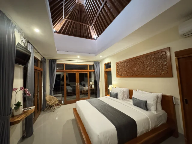 First floor bedroom with garden views at Jambangan Bali Villa Ubud