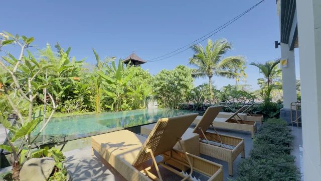 Swimming pool at golden hour at Jambangan Bali Villa Ubud